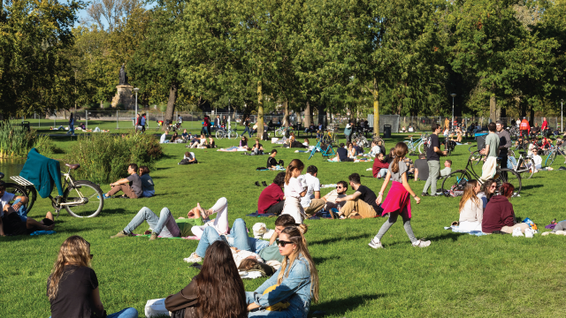 People enjoy the outdoors on the lawn of Vondelpark in Amsterdam. (Getty Images)